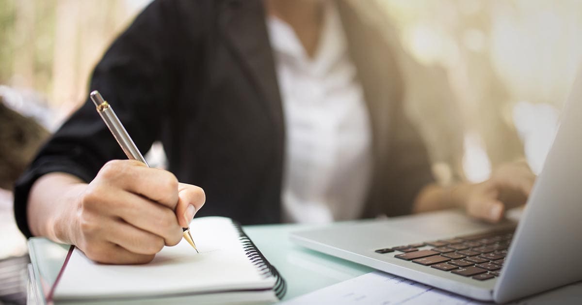 Photo of female writing