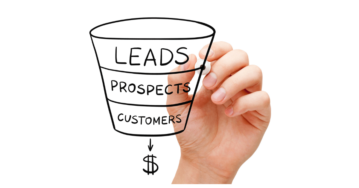 A hand drawing a funnel with leads and prospects, symbolizing an effective lead management solution